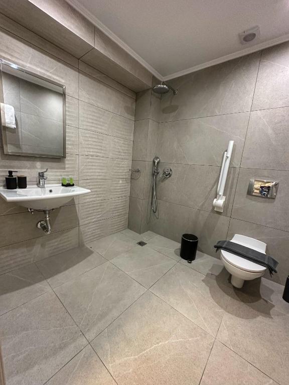 Koupelna v ubytování Bianco Mare Studios-Apartments