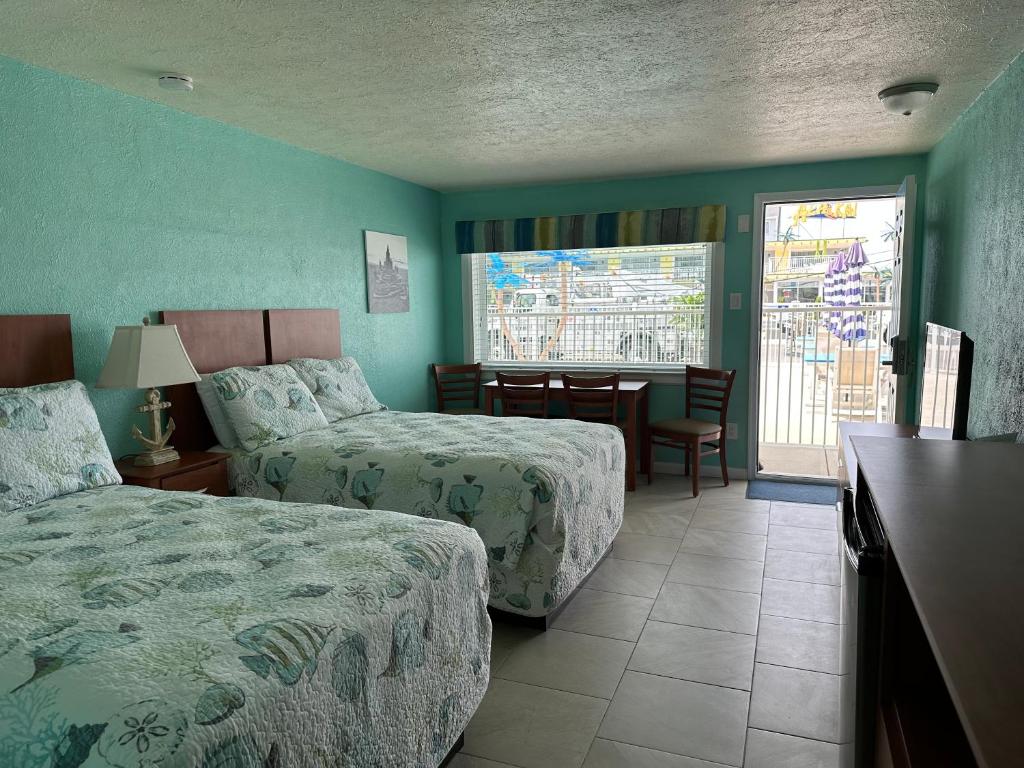 Postel nebo postele na pokoji v ubytování Ala Kai Resort Motel