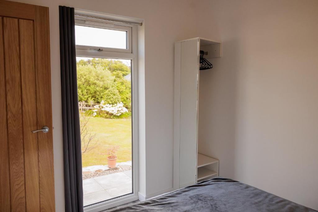 Postel nebo postele na pokoji v ubytování Ardvreck Chalet self-catering