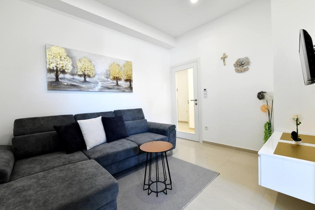 TV a/nebo společenská místnost v ubytování Apartment Mary 3