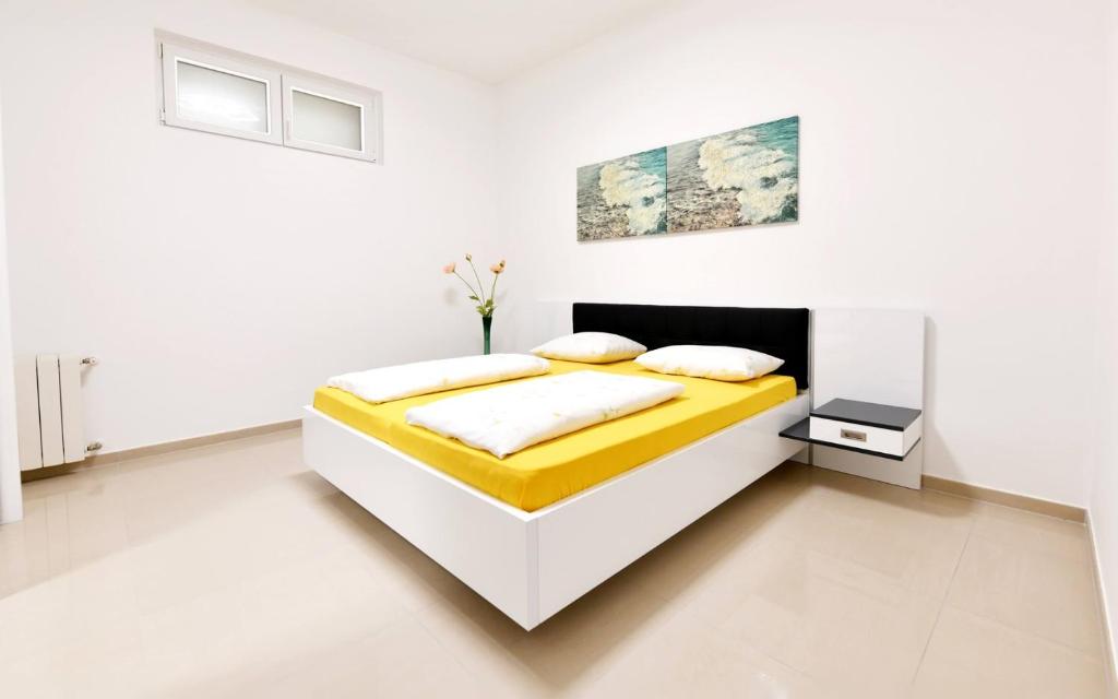 Postel nebo postele na pokoji v ubytování Apartment Mary 3
