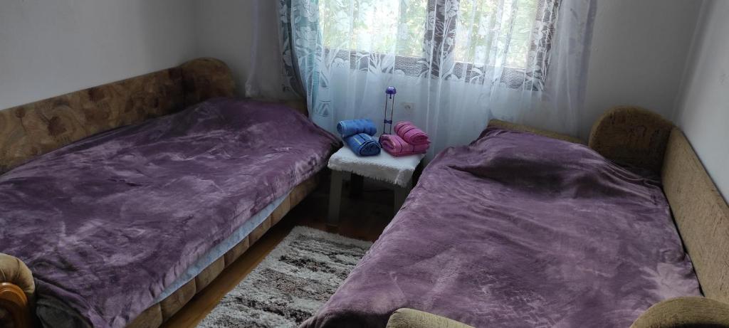 Postel nebo postele na pokoji v ubytování 202