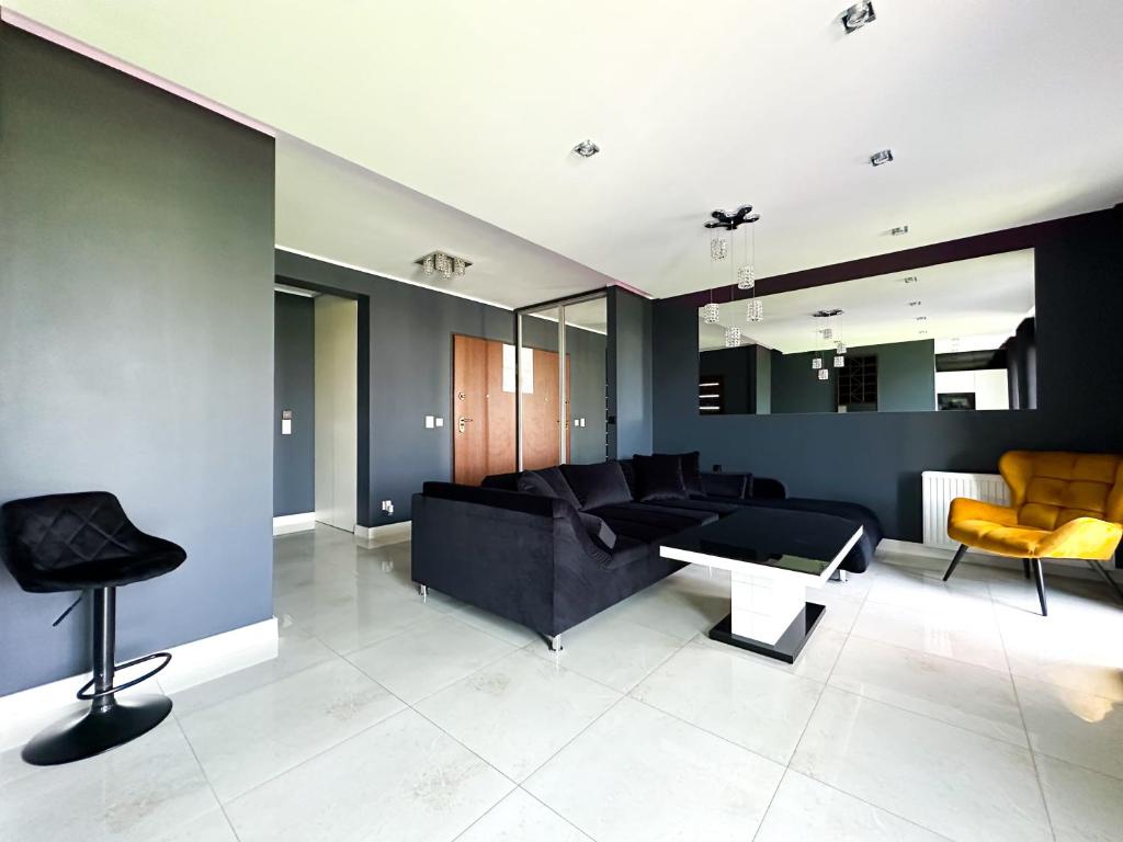 Posedenie v ubytovaní LUXURY APARTAMENT Z DUŻYM TARASEM - Park City Poznań