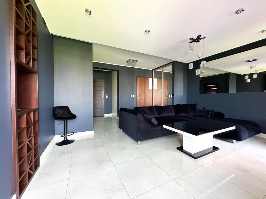 Posedenie v ubytovaní LUXURY APARTAMENT Z DUŻYM TARASEM - Park City Poznań