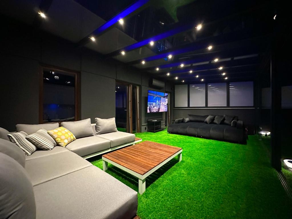 Posedenie v ubytovaní LUXURY APARTAMENT Z DUŻYM TARASEM - Park City Poznań