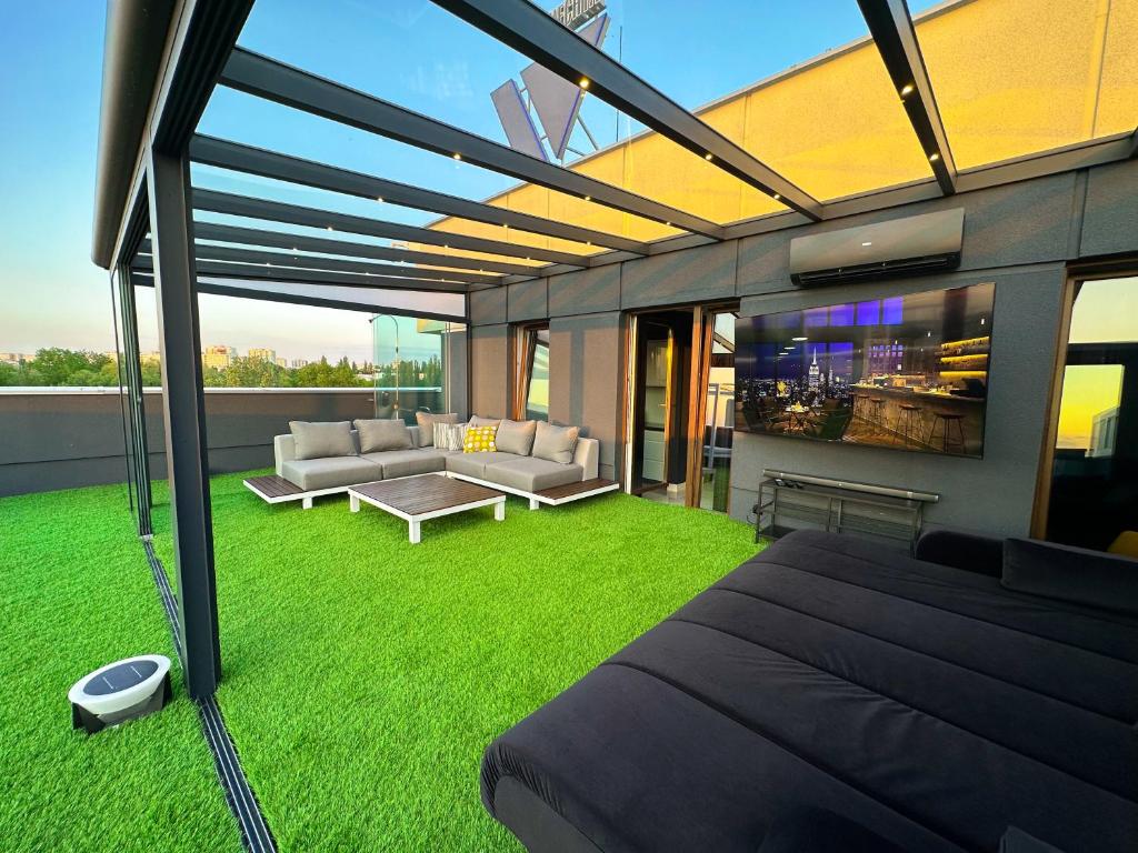 Posedenie v ubytovaní LUXURY APARTAMENT Z DUŻYM TARASEM - Park City Poznań