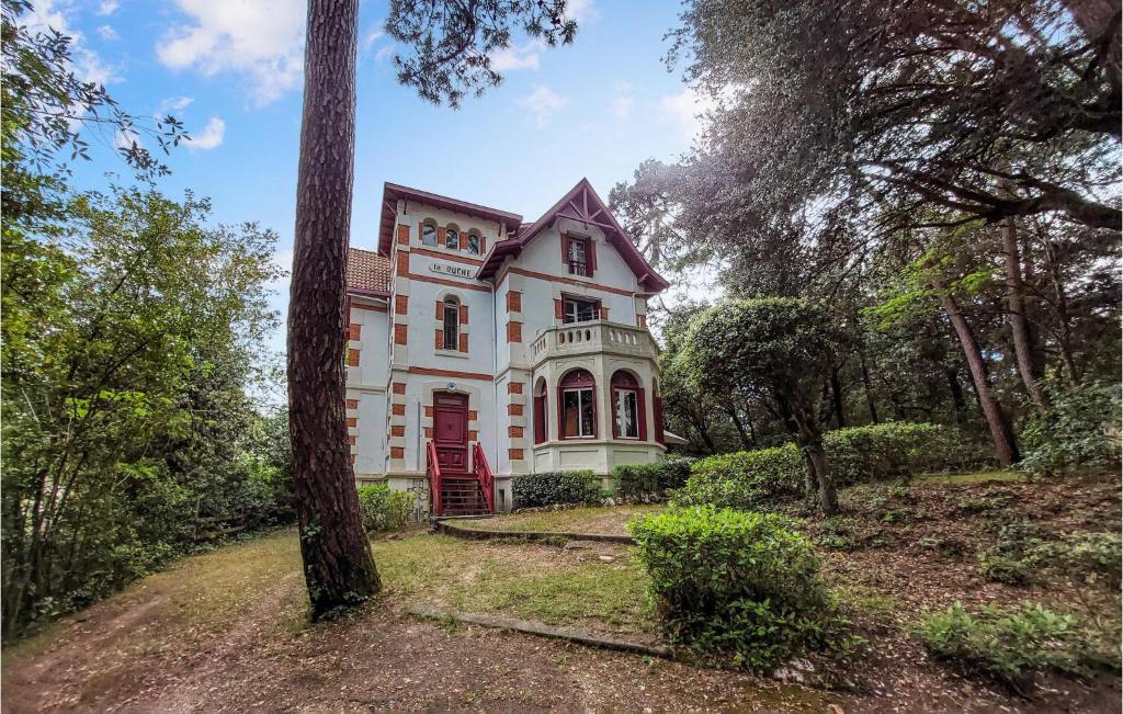 an old house in the middle of a forest at Stunning Home In Saint-palais-sur-mer With Wifi And 6 Bedrooms in Saint-Palais-sur-Mer