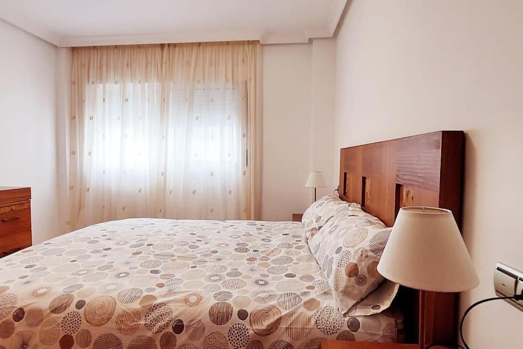 Postel nebo postele na pokoji v ubytování Acogedor piso cerca de la playa