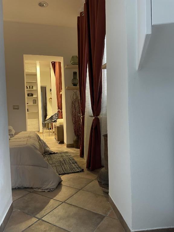 Postel nebo postele na pokoji v ubytování Epicuro guest house