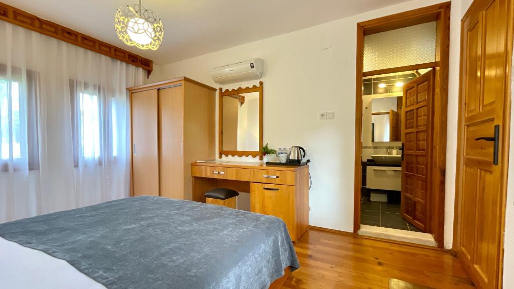 Kuchyň nebo kuchyňský kout v ubytování Aida Hotel