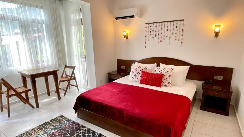 Postel nebo postele na pokoji v ubytování Aida Hotel