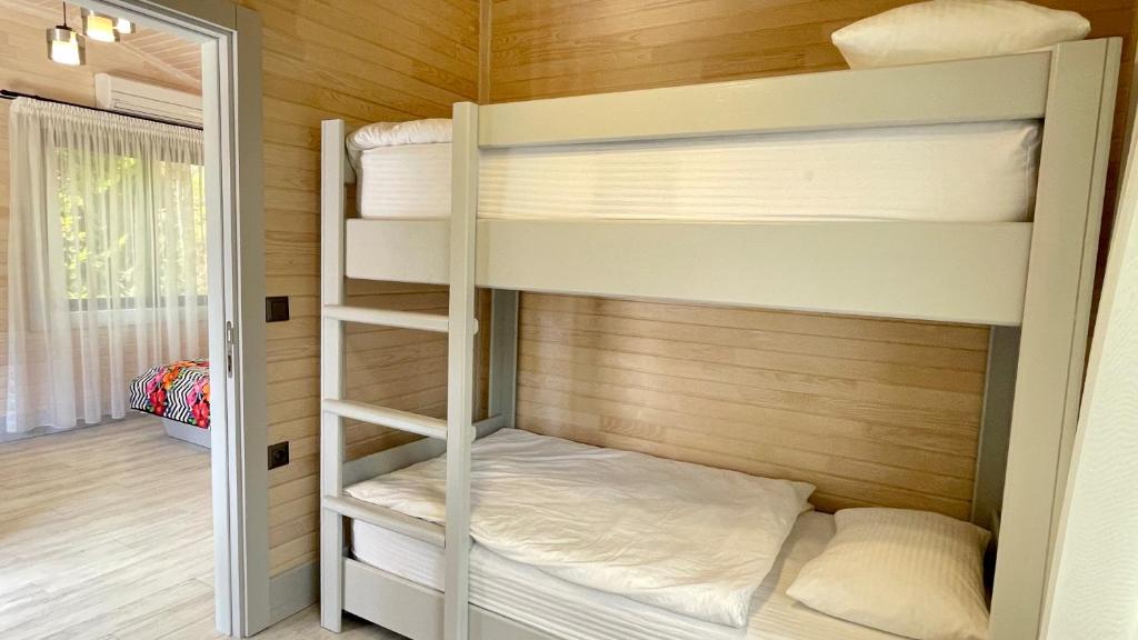 Postel nebo postele na pokoji v ubytování Aida Hotel