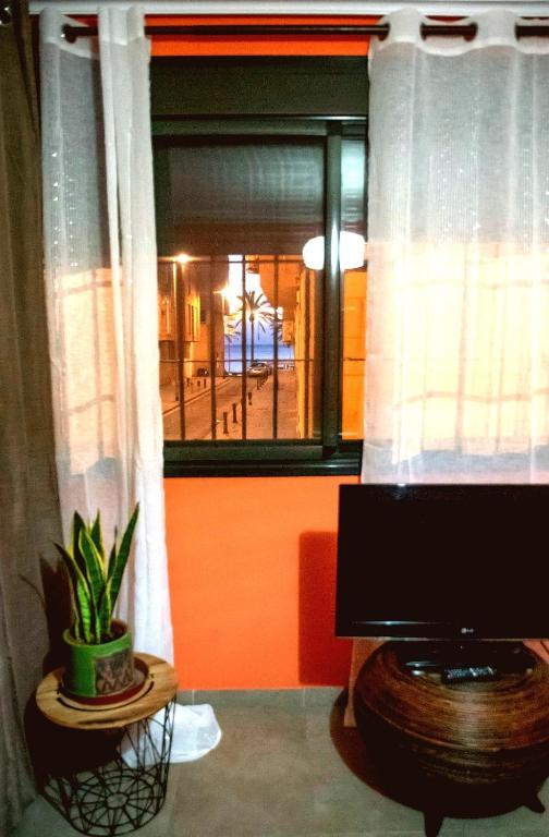 TV a/nebo společenská místnost v ubytování Apartamento El Zapillo