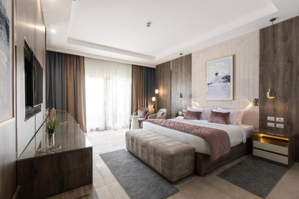 Postel nebo postele na pokoji v ubytování Gewan Resort New Alamein