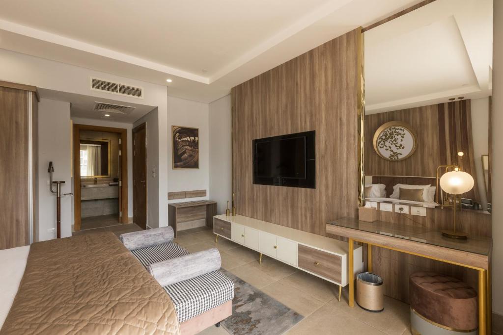 TV a/nebo společenská místnost v ubytování Gewan Resort New Alamein