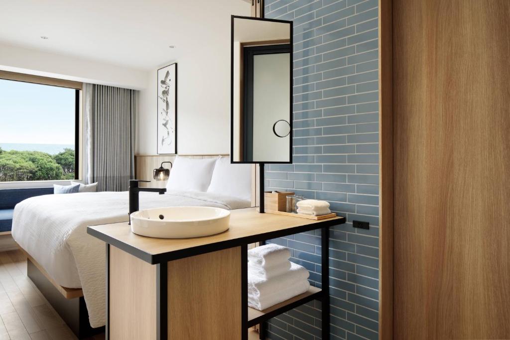 Postel nebo postele na pokoji v ubytování Fairfield by Marriott Mie Kumano Kodo Mihama