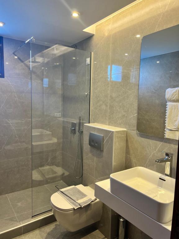 Koupelna v ubytování Kymata Hotel