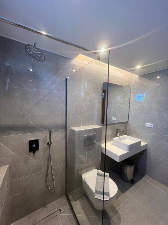 Koupelna v ubytování Kymata Hotel