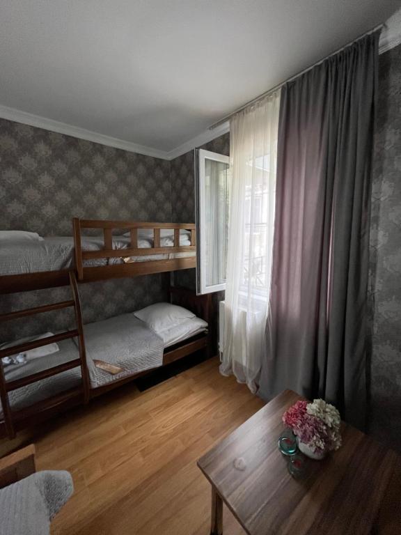 Postel nebo postele na pokoji v ubytování Hillside Guesthouse