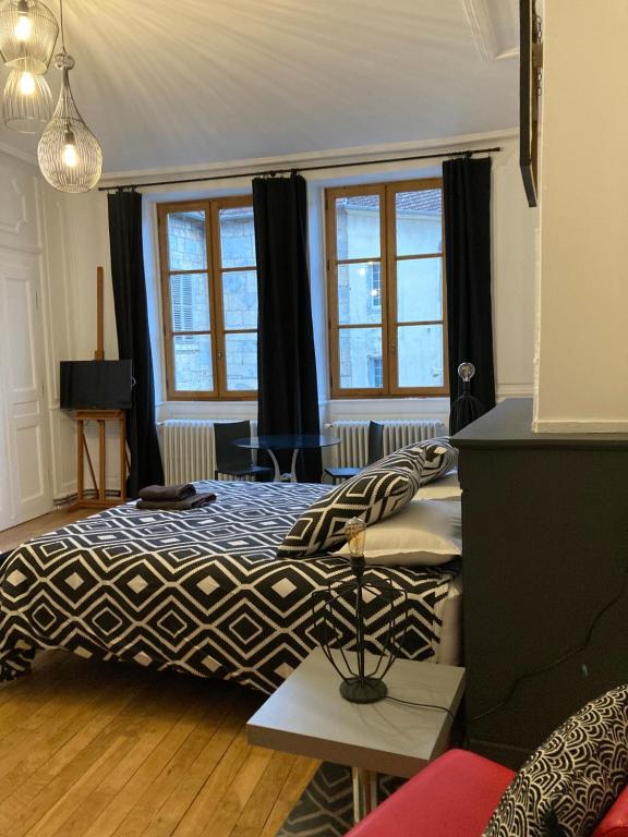 Postel nebo postele na pokoji v ubytování Maison La Tourelle