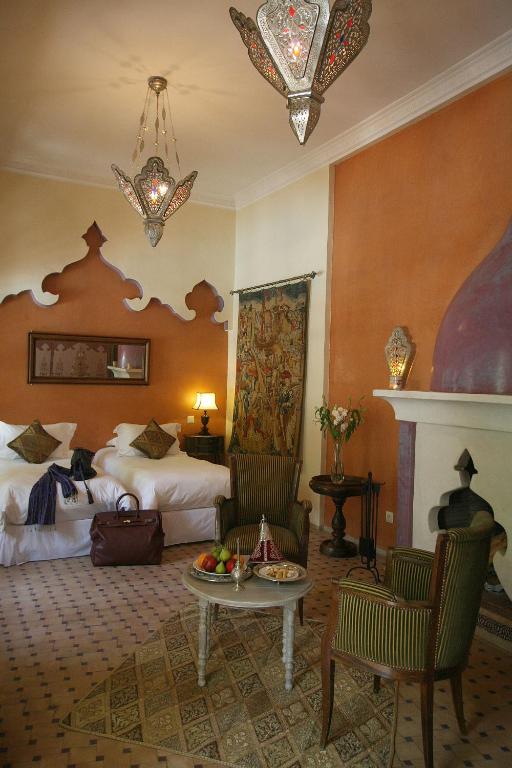 Postel nebo postele na pokoji v ubytování Demeures d'Orient Riad & Spa