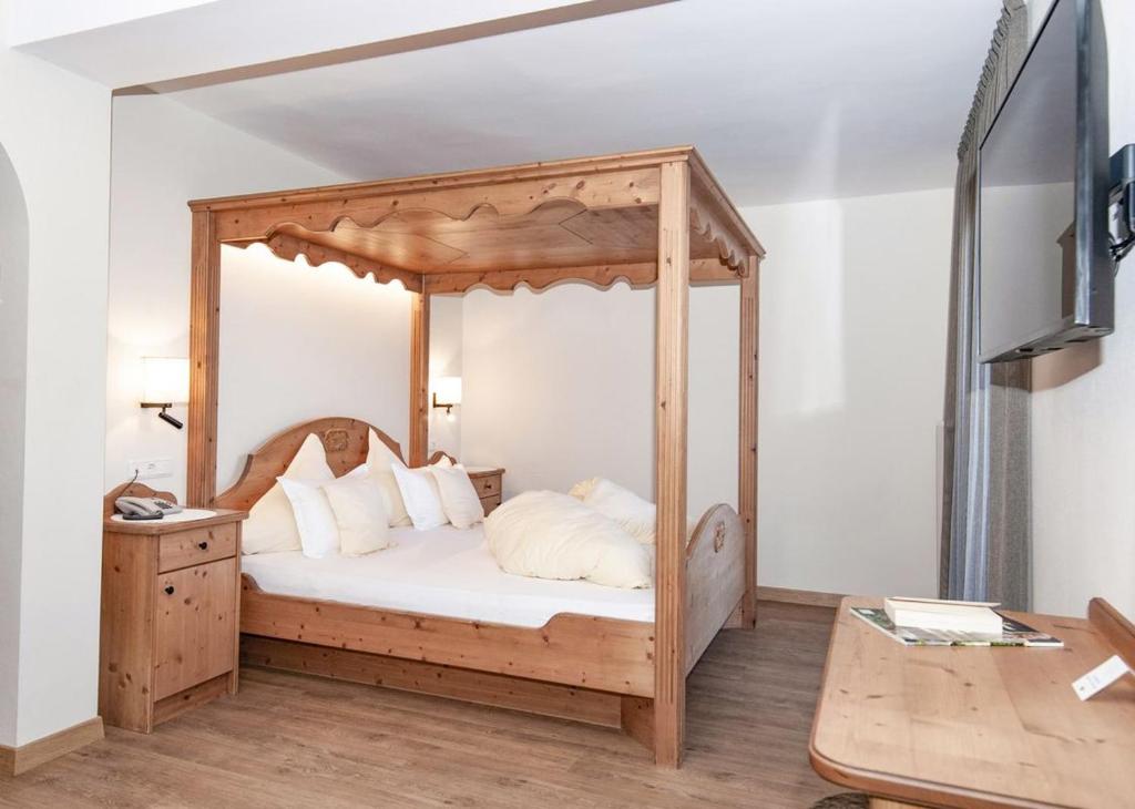 Postel nebo postele na pokoji v ubytování Hotel Pichler