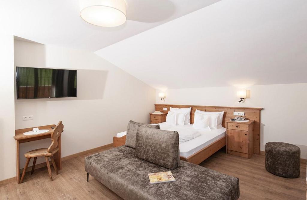 Postel nebo postele na pokoji v ubytování Hotel Pichler