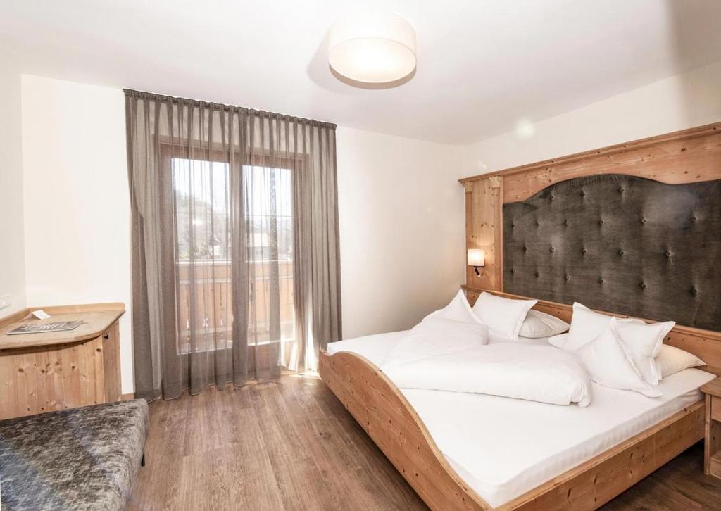 Postel nebo postele na pokoji v ubytování Hotel Pichler