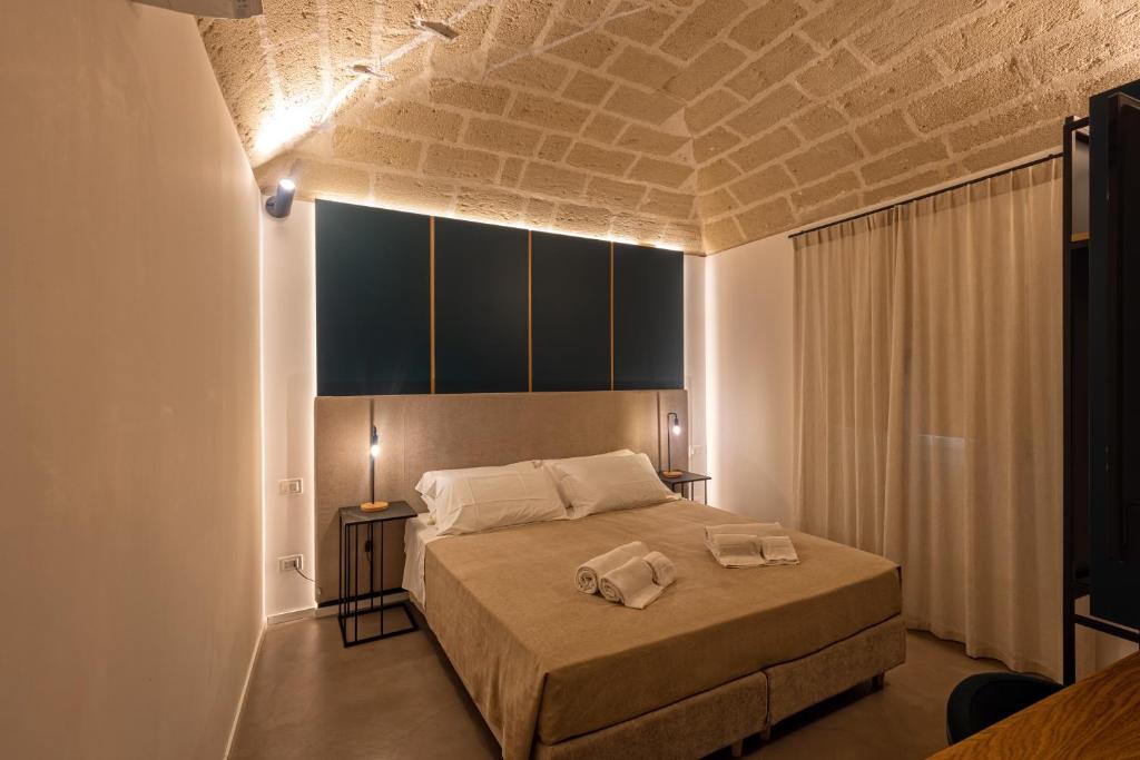 Postel nebo postele na pokoji v ubytování Mazzini Accommodation