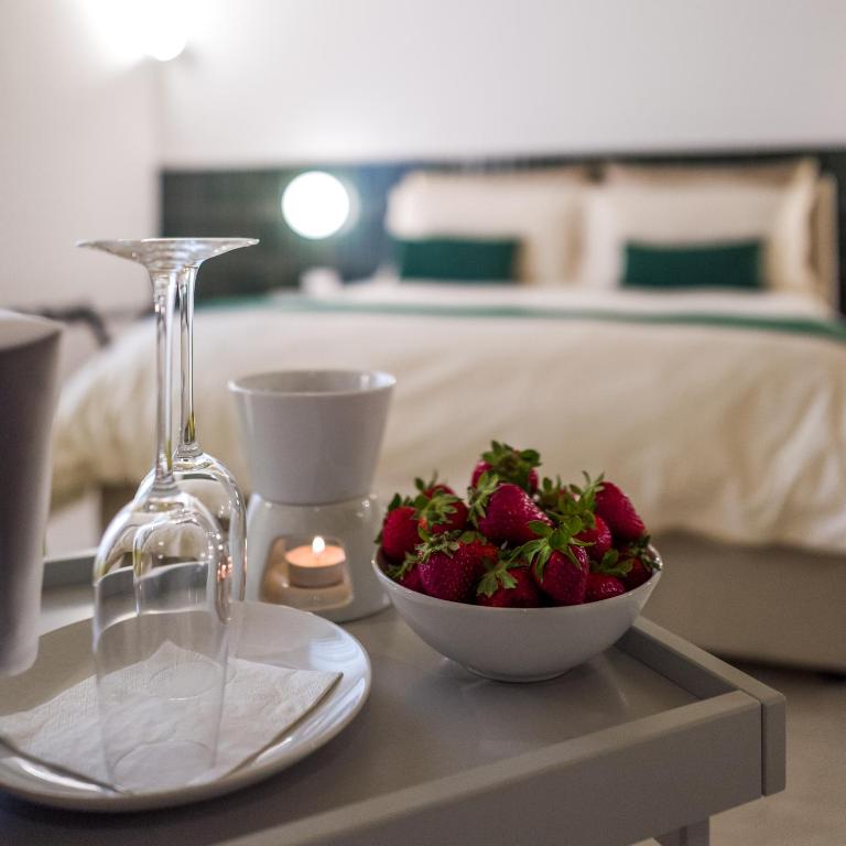 Postel nebo postele na pokoji v ubytování Casa Minerva - Suite e Relax