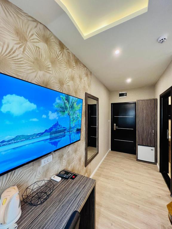 TV a/nebo společenská místnost v ubytování Side One Design Hotel Garni