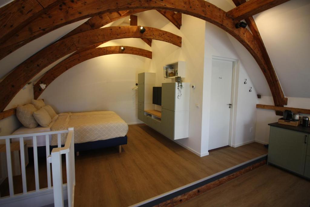 Postel nebo postele na pokoji v ubytování B&B TxL