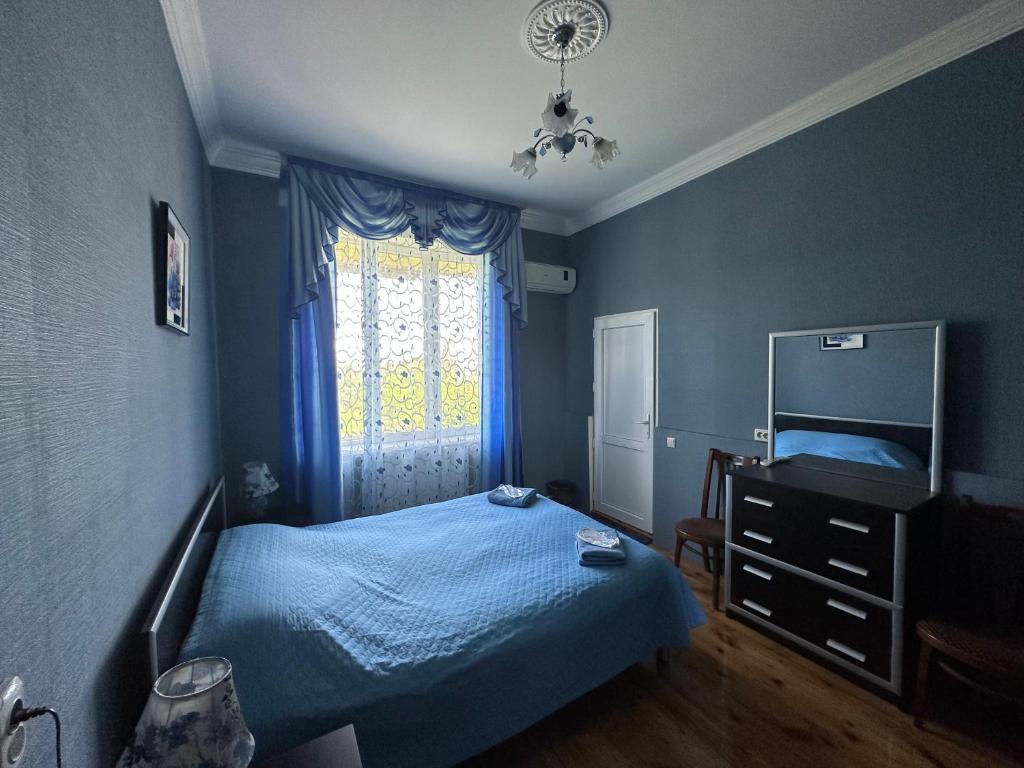 Postel nebo postele na pokoji v ubytování Mate Guesthouse