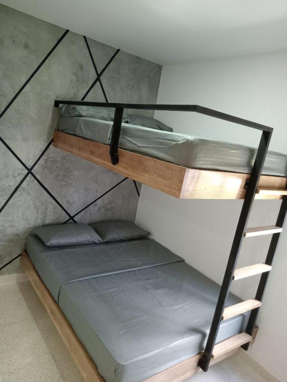 Postel nebo postele na pokoji v ubytování zara's apartamento en coveñas