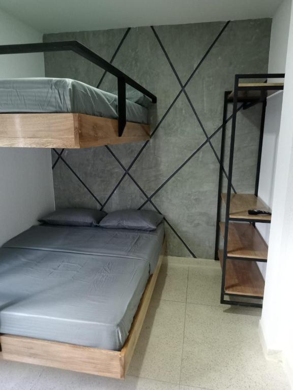 Postel nebo postele na pokoji v ubytování zara's apartamento en coveñas