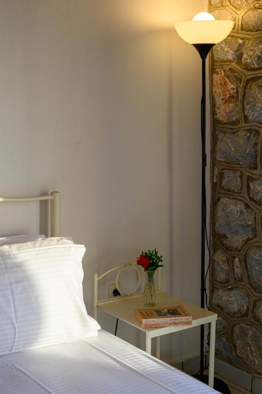 Postel nebo postele na pokoji v ubytování Σελήνη