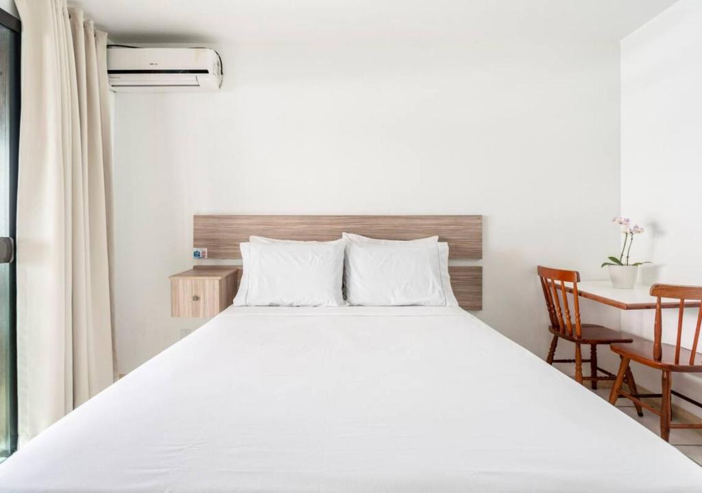 Cama ou camas em um quarto em Pousada Enseada dos Golfinhos