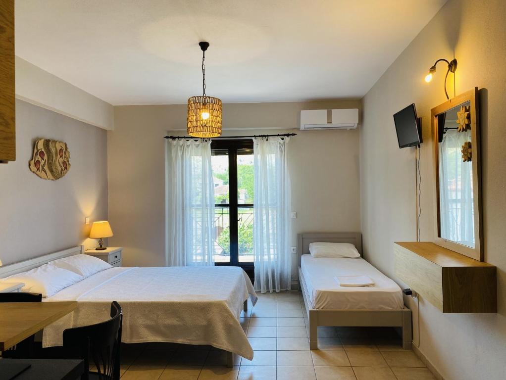 Ein Bett oder Betten in einem Zimmer der Unterkunft Harmony Seaside Pelion