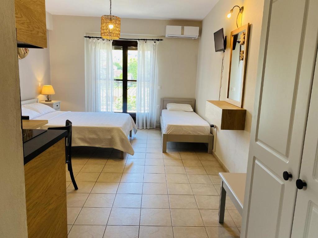 Ein Bett oder Betten in einem Zimmer der Unterkunft Harmony Seaside Pelion