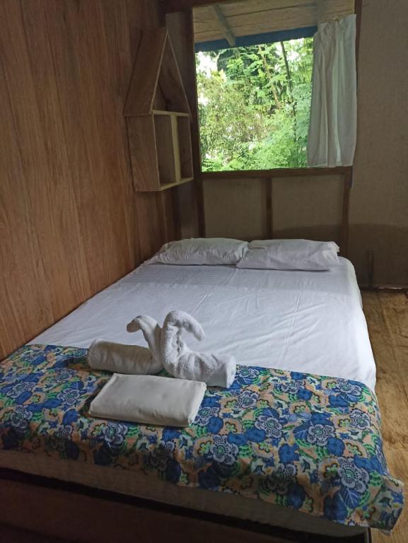 Letto o letti in una camera di Ecohotel Bahía Terco