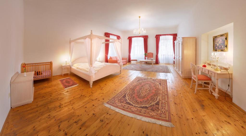 Postel nebo postele na pokoji v ubytování Hotel Růže