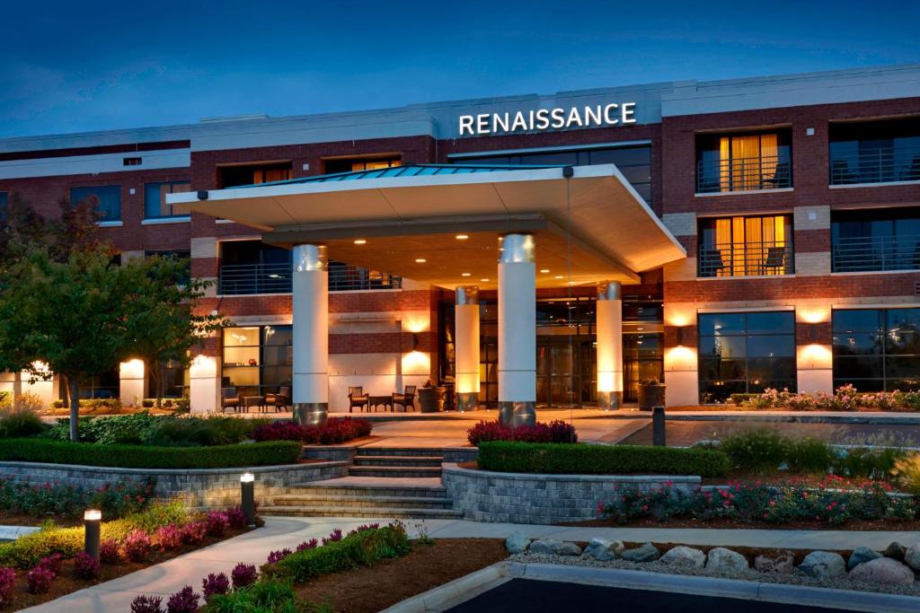 a building with a sign that reads reassurance at The Baronette Renaissance Detroit-Novi Hotel in Novi