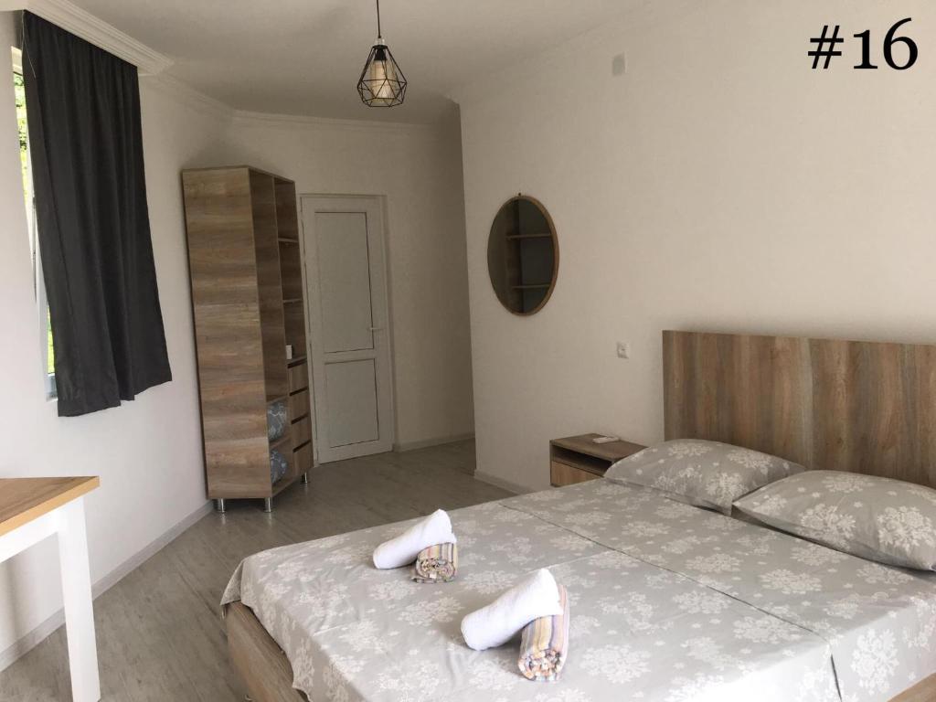 Postel nebo postele na pokoji v ubytování Rezo's House