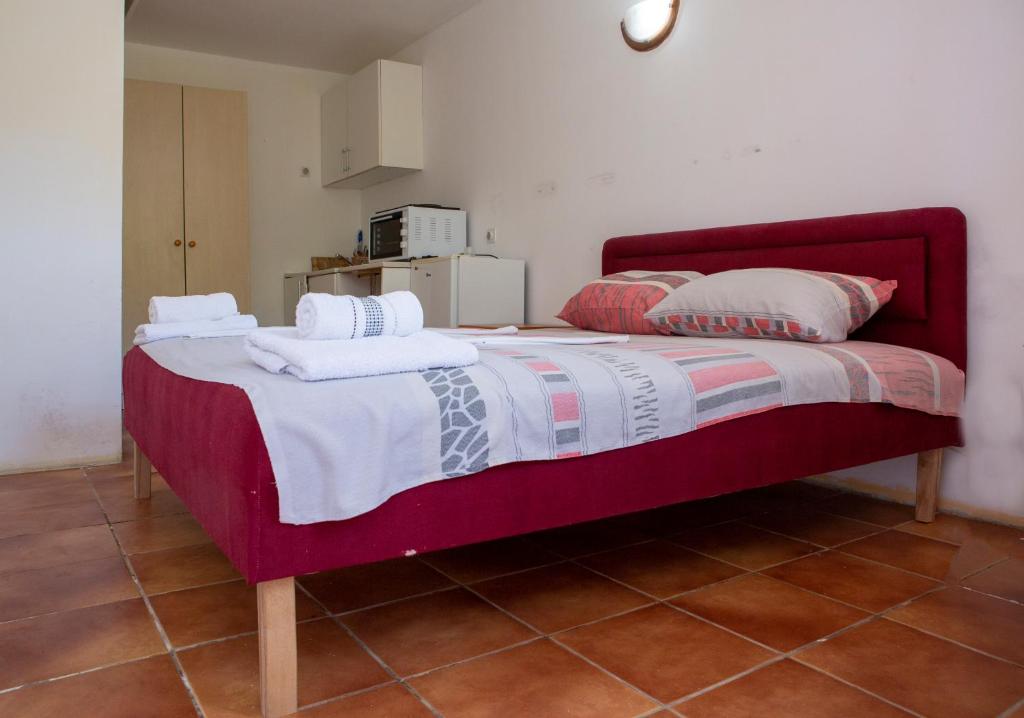 Postel nebo postele na pokoji v ubytování Family Apartments Vukcevic
