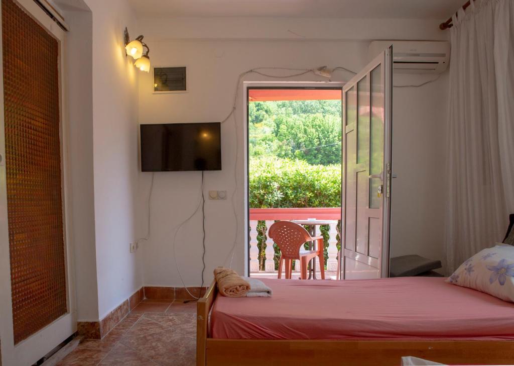 Postel nebo postele na pokoji v ubytování Family Apartments Vukcevic