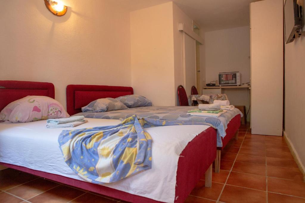 Postel nebo postele na pokoji v ubytování Family Apartments Vukcevic