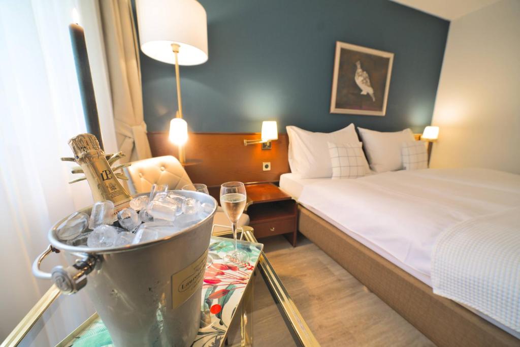 Postel nebo postele na pokoji v ubytování Tulip Inn Beaulieu Lausanne