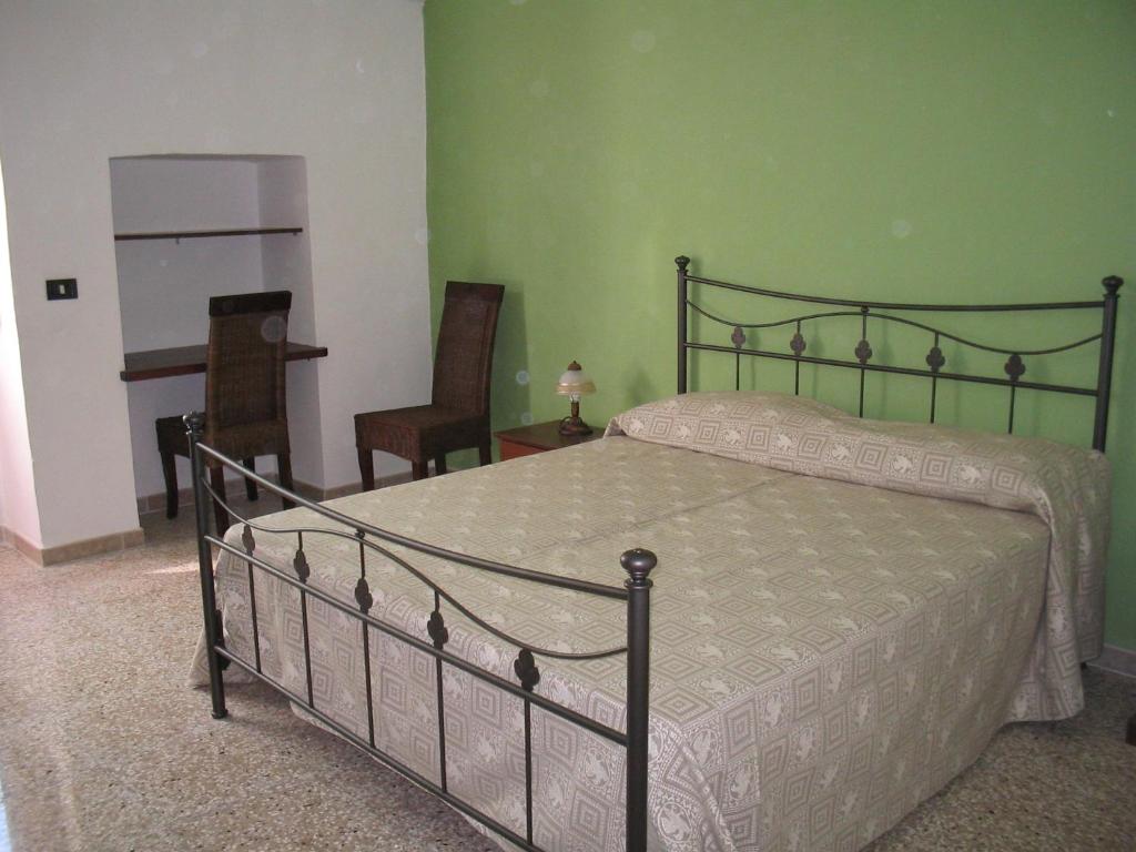 Postel nebo postele na pokoji v ubytování B&B Camera A Sud Tuglie Gallipoli