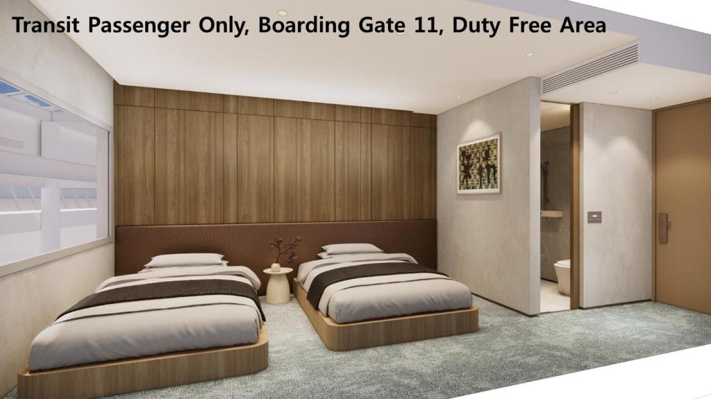 Postel nebo postele na pokoji v ubytování Incheon Airport Transit Hotel Terminal 1