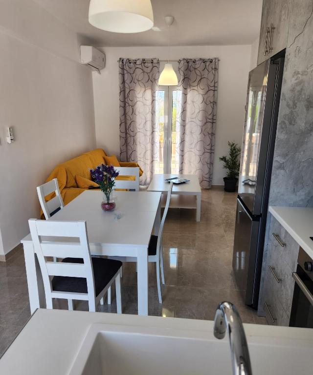 Kuchyň nebo kuchyňský kout v ubytování Kos Harmony Apartments